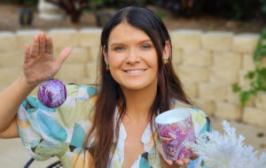 Local contemporary artist and Kalkadoon woman, Chern’ee Sutton has designed a limited-edition collection of Christmas baubles and candles. Photo: contributed.