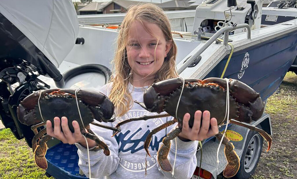 Jamison Rollings with a pair of huge muddies caught in the Kolan