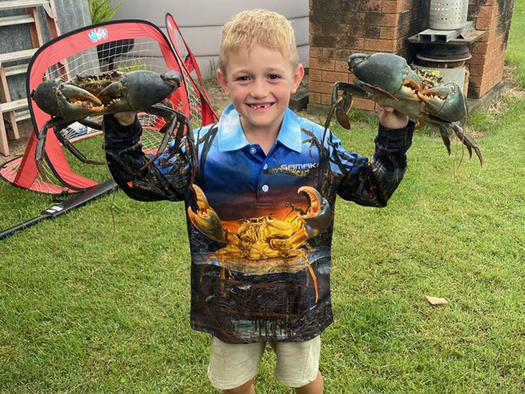 Brantley Ford with a pair of quality mud crabs caught in the Kolan.