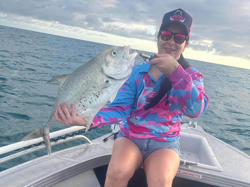 Sophie with a solid trevally caught at the 2 mile.
fishing holiday period