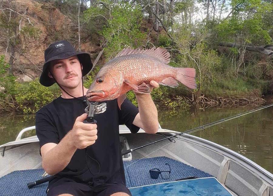 Daniel Duncan with a 48cm jack caught in the Kolan.