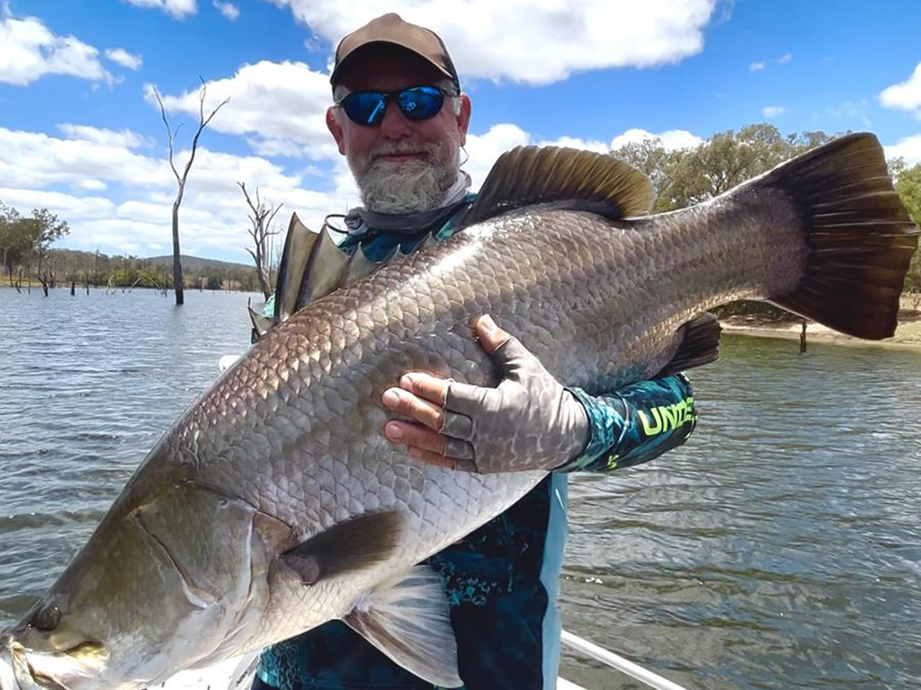 Paul Kuplen with a great Lake Monduran barra. quality fishing