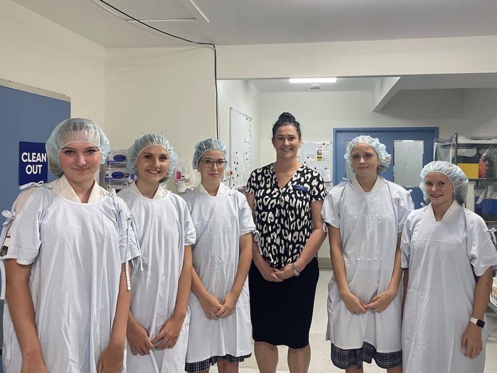 Shalom College students Saije Jensen, Ava Philips, Kasey Krueger, Casey Giles and Jenna Maeyke with Mater Private Hospital Bundaberg General Manager Catherine Hackney