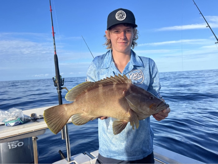 Cayden Raines with a quality maori cod.