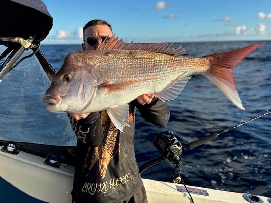 Dylan Taylor with a solid snapper caught whilst deep dropping.