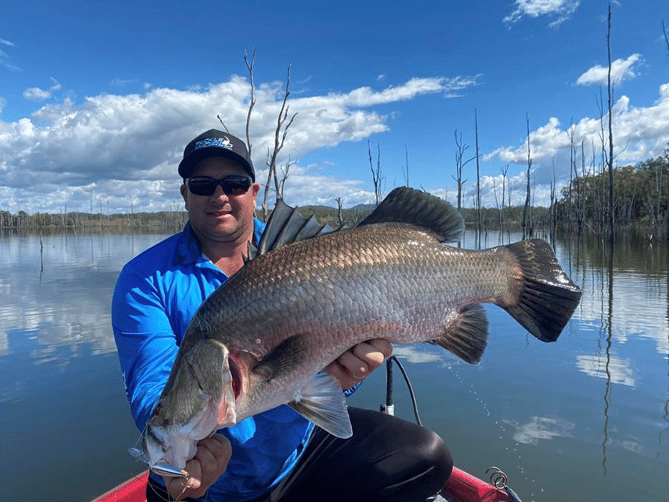 Nathan Sutton with a solid Lake Monduran barra caught