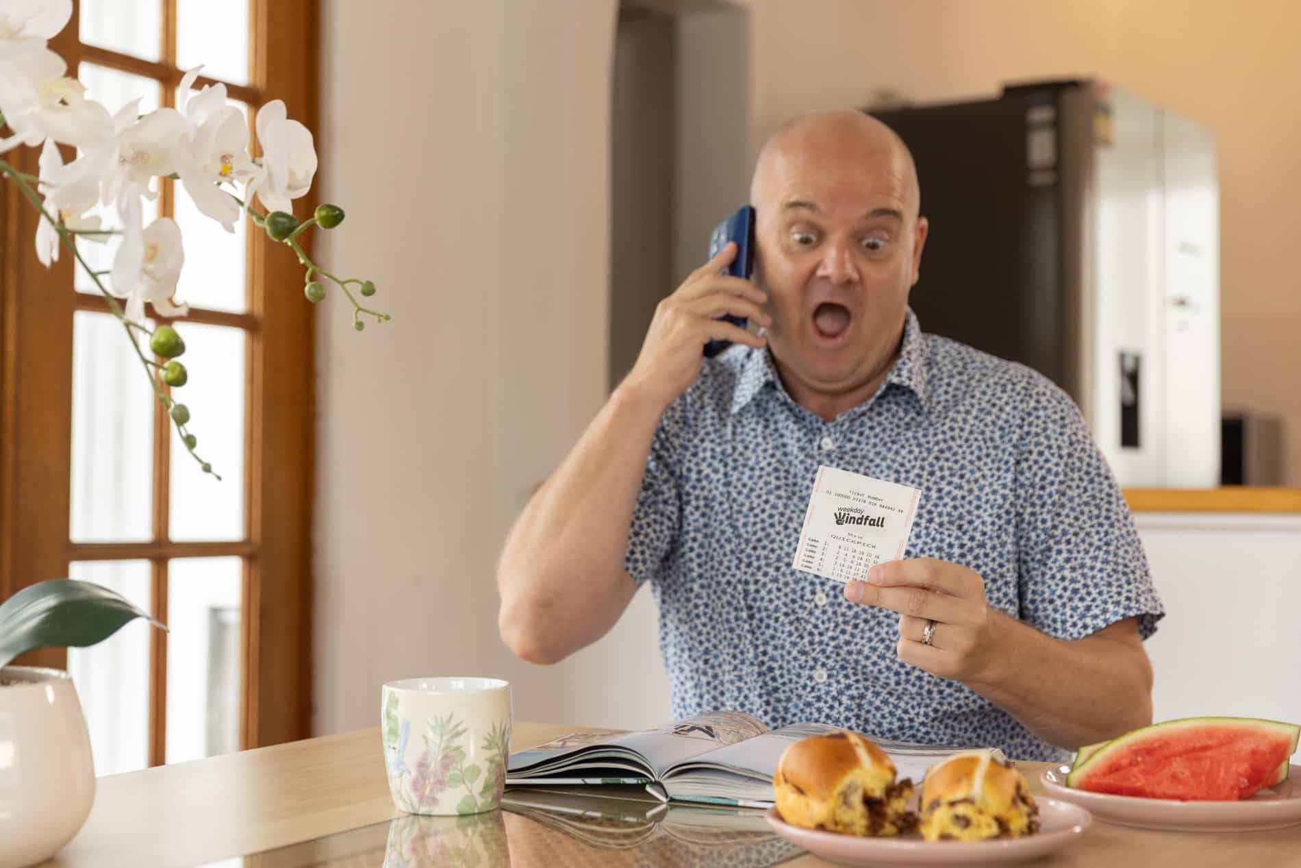 A Gin Gin dad is grinning after scoring a life-changing million-dollar win in last night’s Weekday Windfall draw.