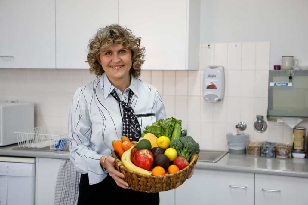 Cr Tracey McPhee with examples of some of the fresh produce the community can enjoy as part of the Forgotten Foods to Fabulous Feasts program.