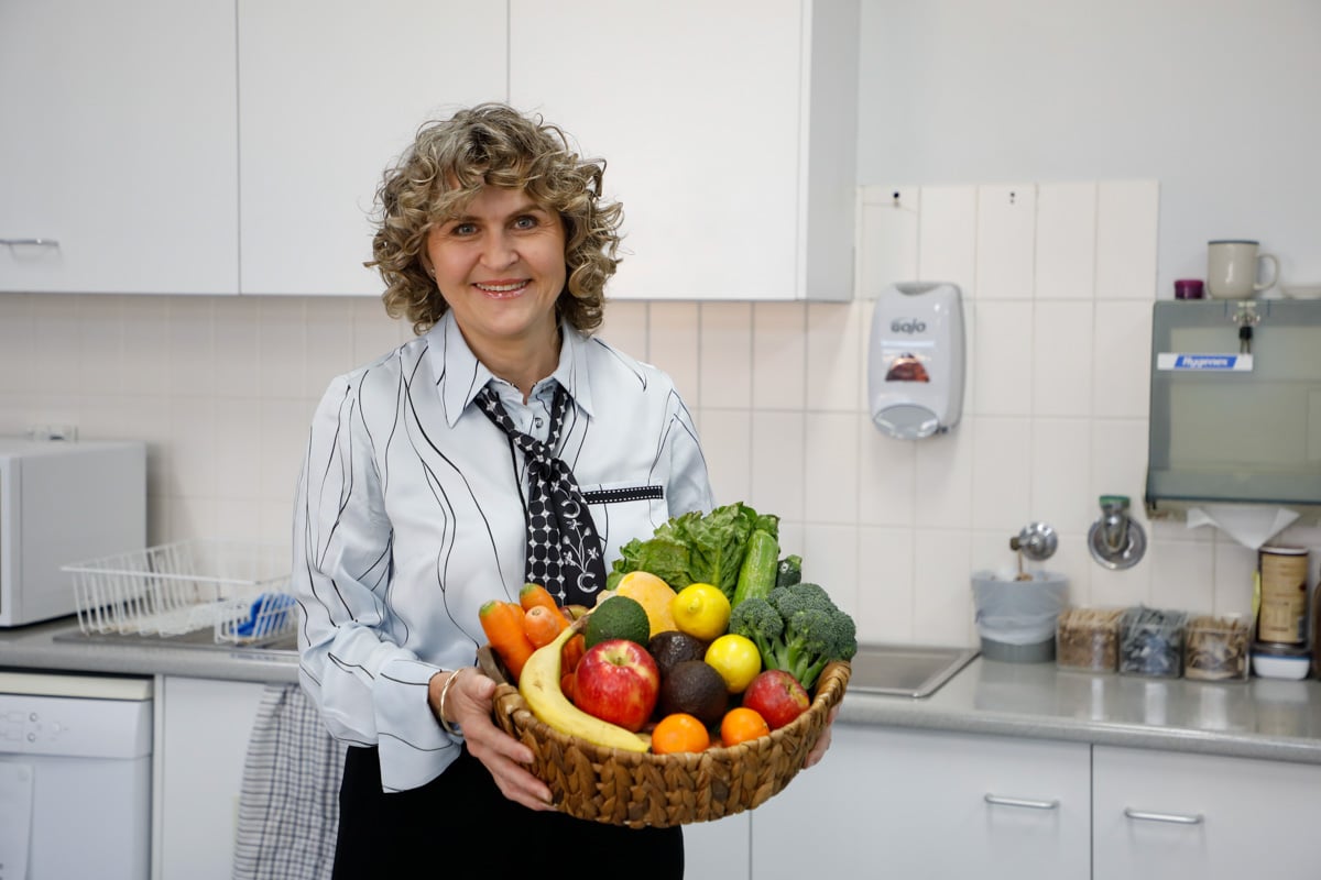 Cr Tracey McPhee with examples of some of the fresh produce the community can enjoy as part of the Forgotten Foods to Fabulous Feasts program.
