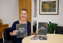 Mayor Helen Blackburn signs the Welcoming Cities Commitment